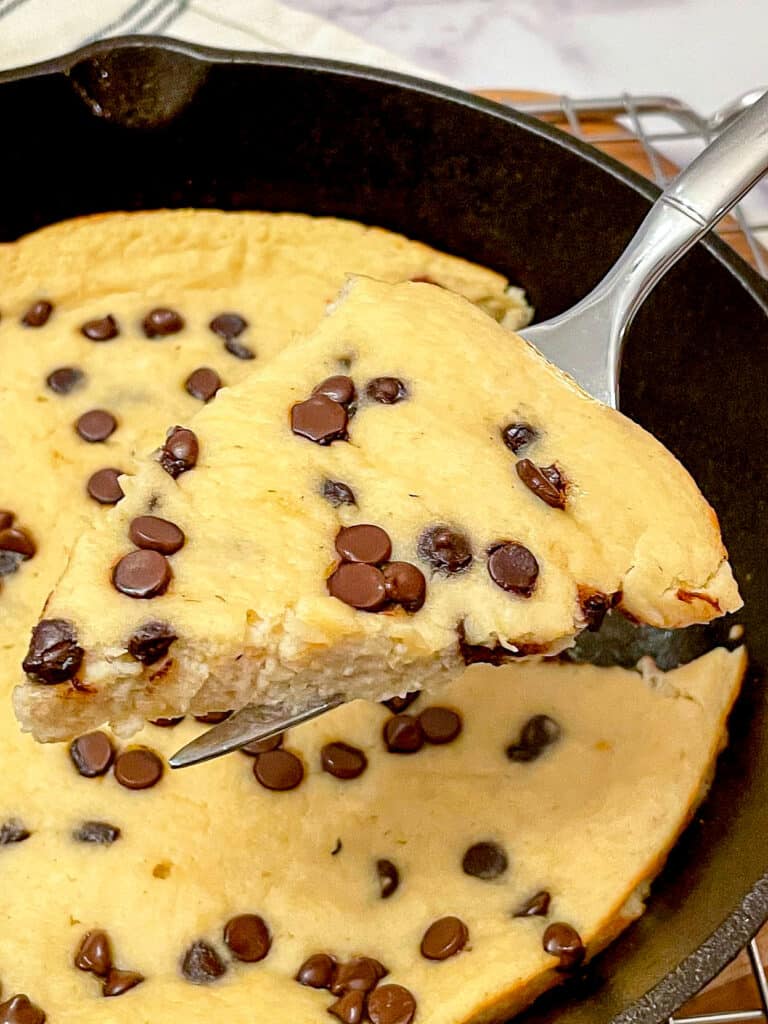 Zoomed in view of a slice of Chocolate Chip Skillet Cookie.
