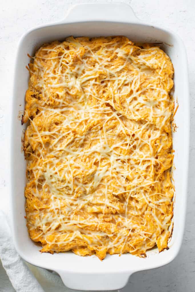 Buffalo chicken, spaghetti squash, and cheese baked in a casserole dish