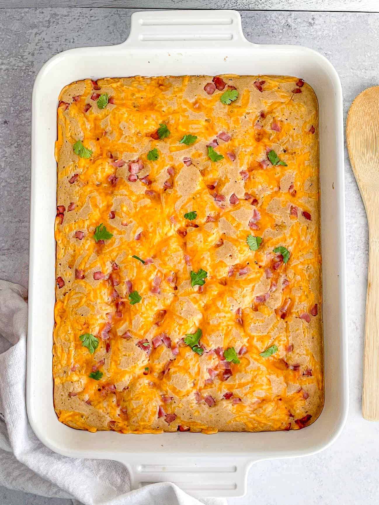 Ham and cheese breakfast bake in a casserole dish.