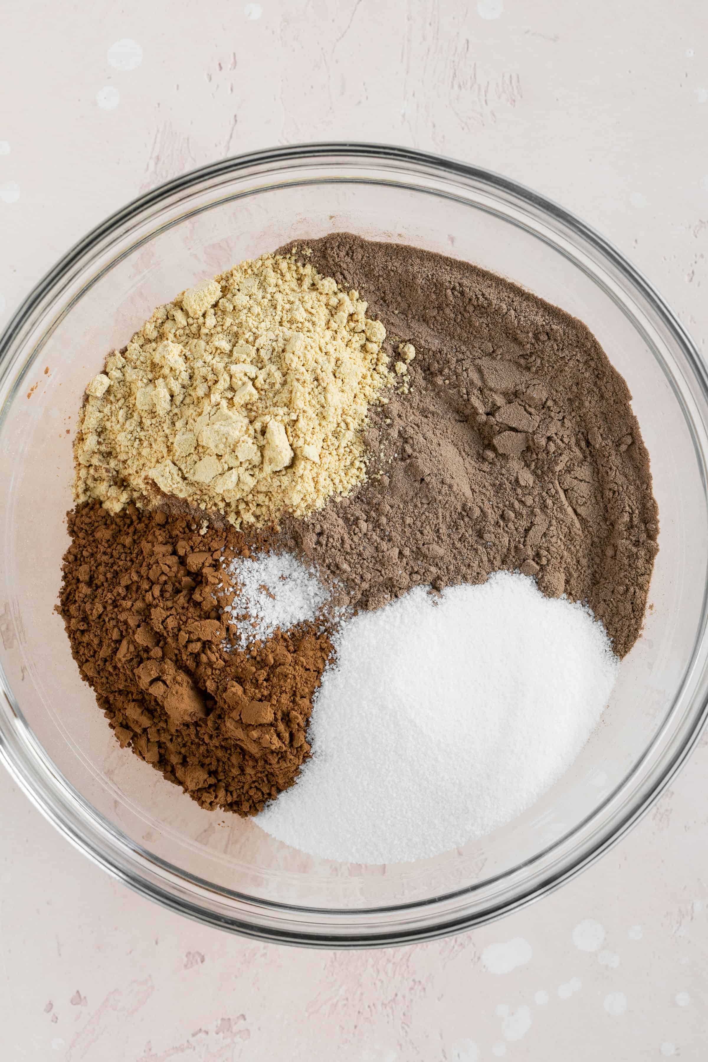 Dry ingredients for healthy brownie batter in a bowl.