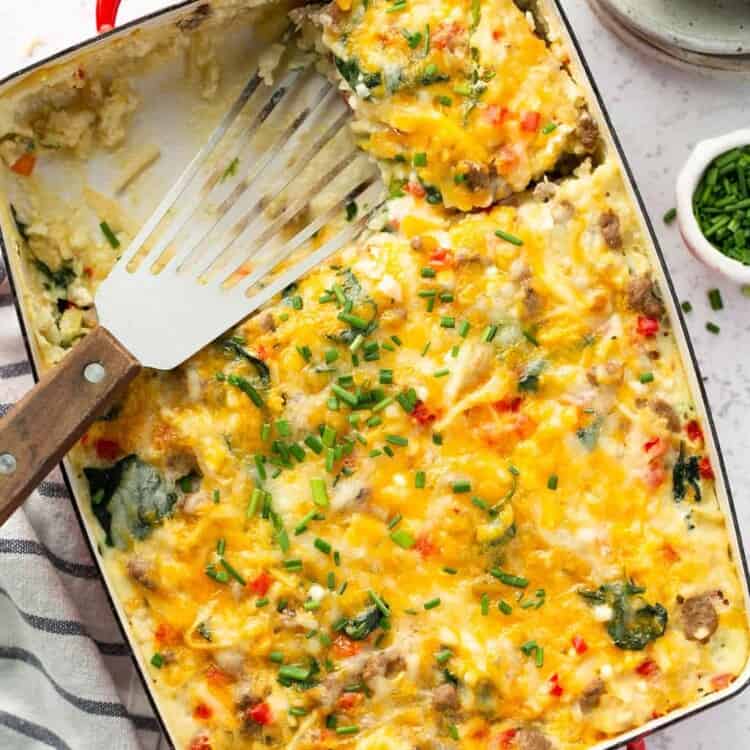 Cheesy southwest hashbrown casserole in a baking dish.