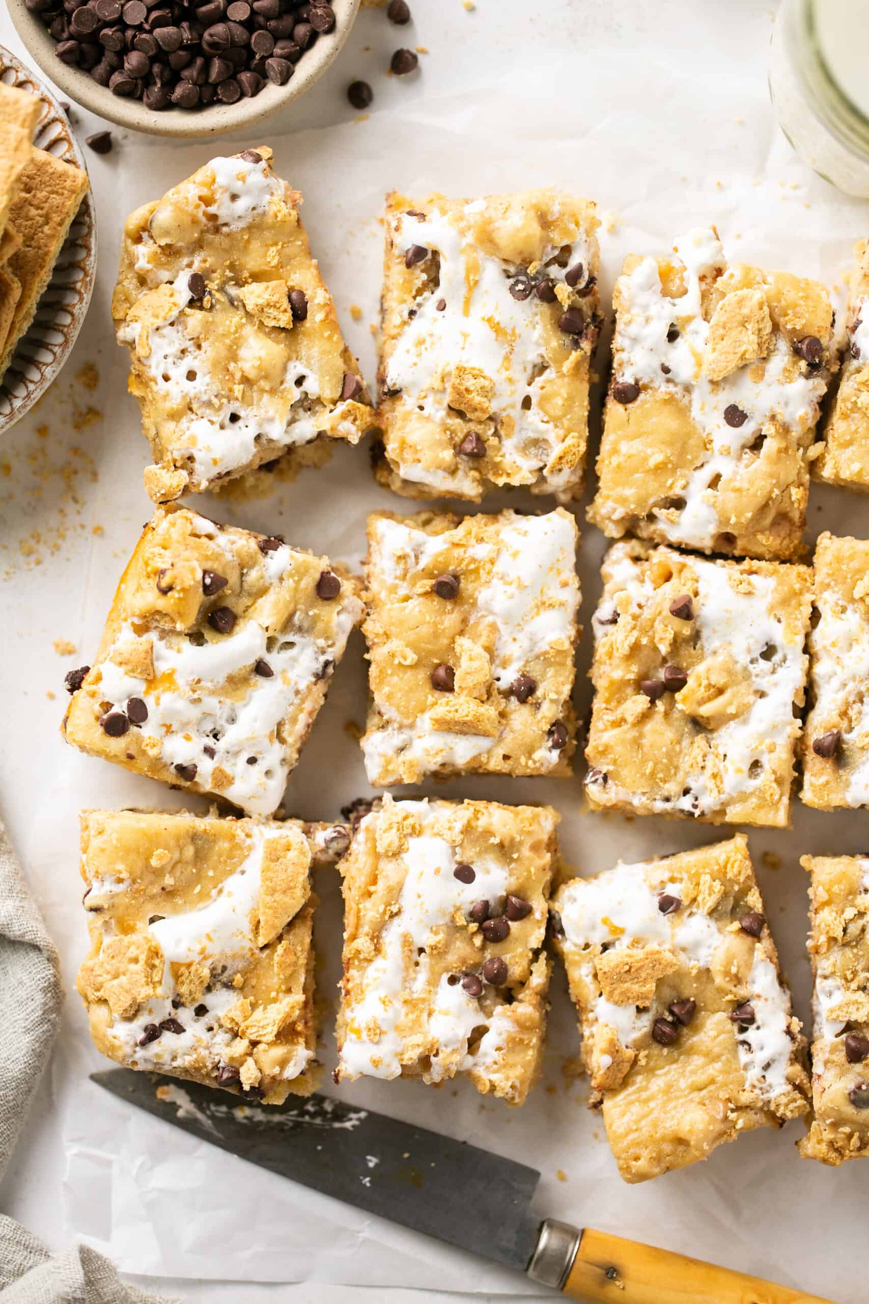 S'mores blondie bars on parchment paper.
