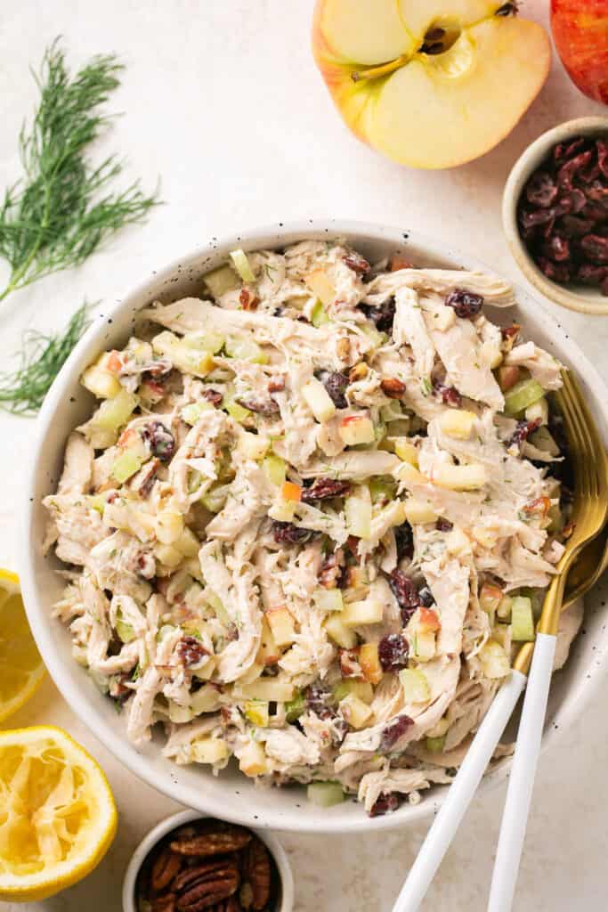 Easy apple pecan chicken salad served in a bowl with 2 fork