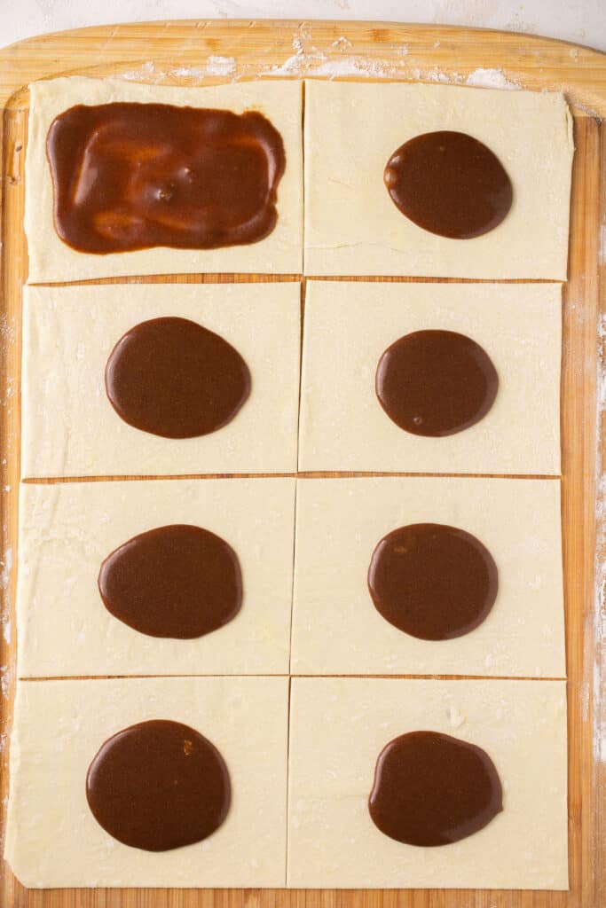 Brown sugar filling on each rectangle of puff pastry.