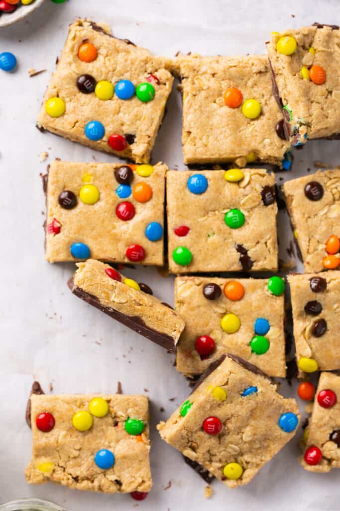 Monster protein cookie dough bars on parchment paper