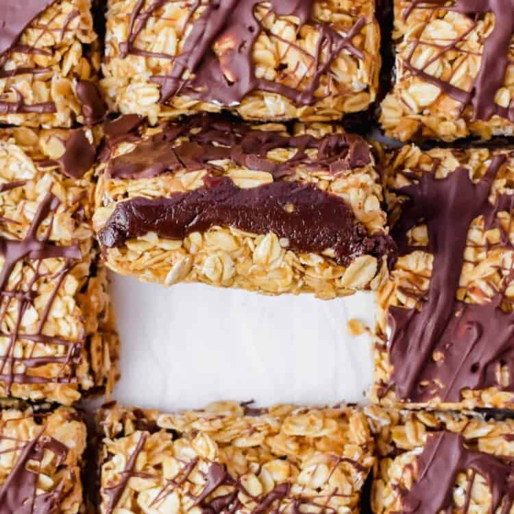 Healthy chocolate peanut butter oatmeal bars drizzled with chocolate.