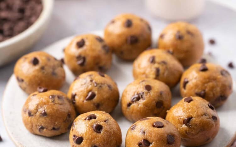 Cookie dough protein bites on a plate.