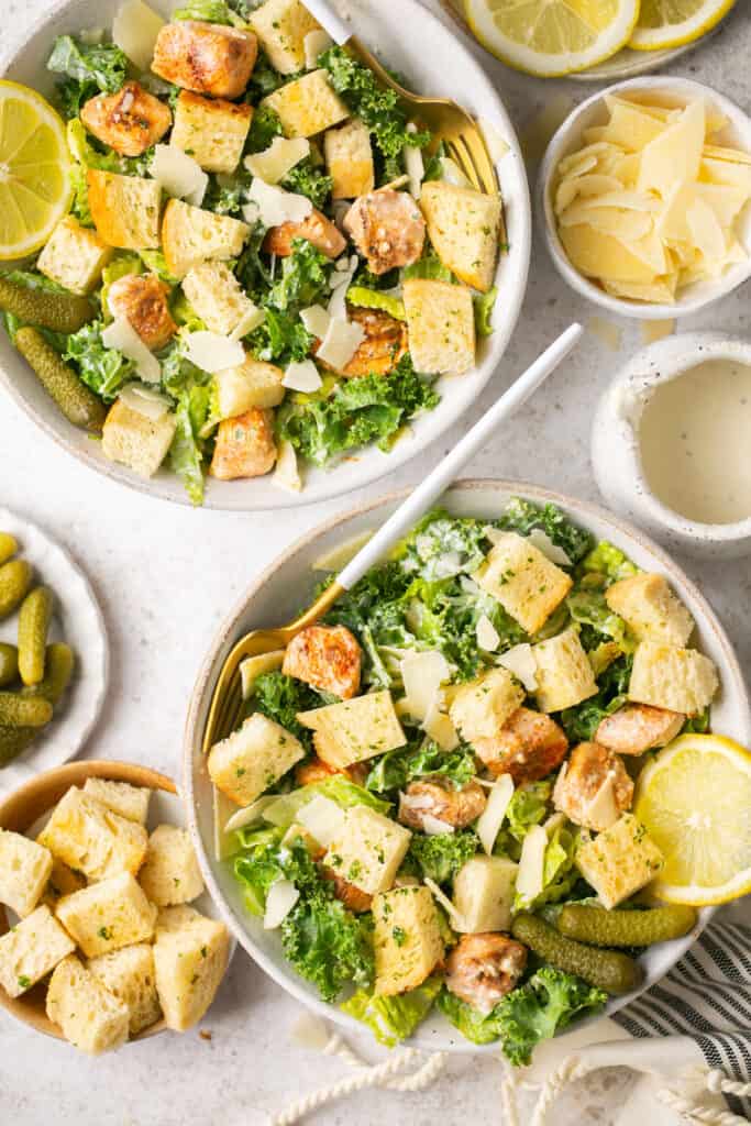 homemade low calorie caesar dressing on a healthy caesar salad