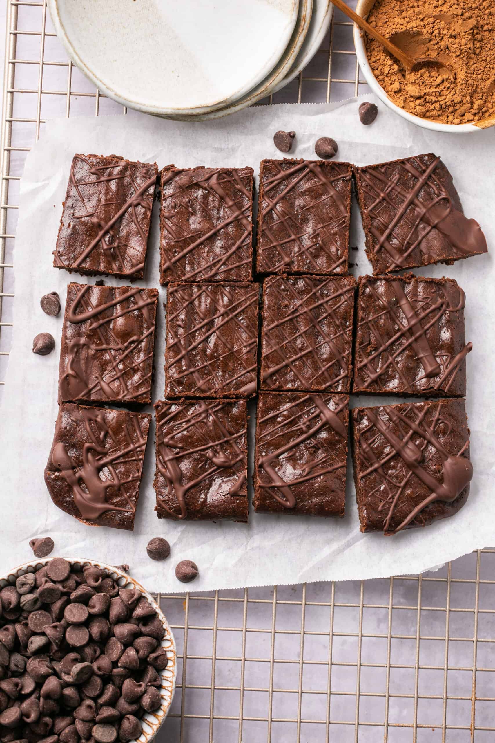 Healthy pumpkin brownies on parchment paper.