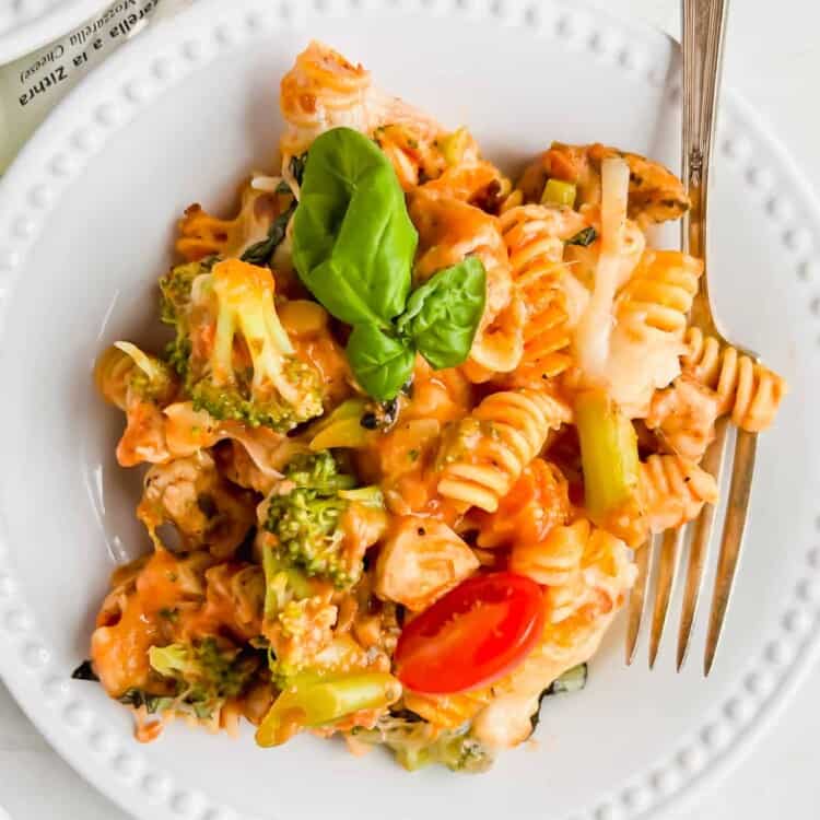 Italian Chicken and Broccoli Pasta Bake on a plate with a fork.