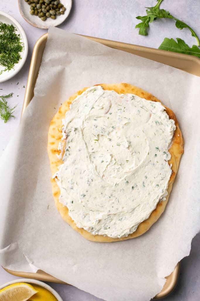 Flatbread topped with herbed cream cheese.