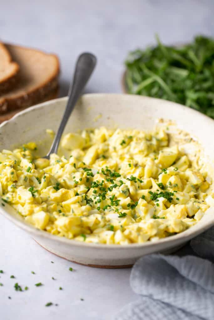 High protein egg salad in a bowl with a spoon