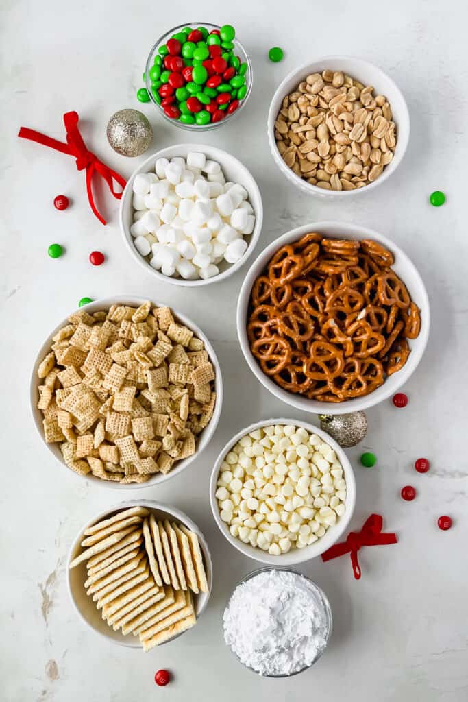 rice chex, pretzels, saltines, marshmallows, white chocolate, peanuts, powdered sugar