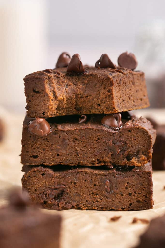 Black bean brownies stacked on top of each other.