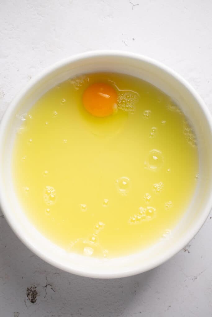 Eggs and egg whites in a glass bowl.