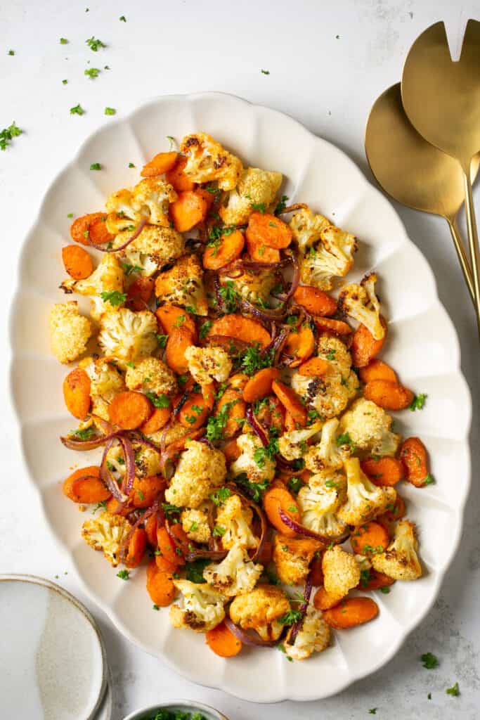 Roasted cauliflower and carrots in a serving dish
