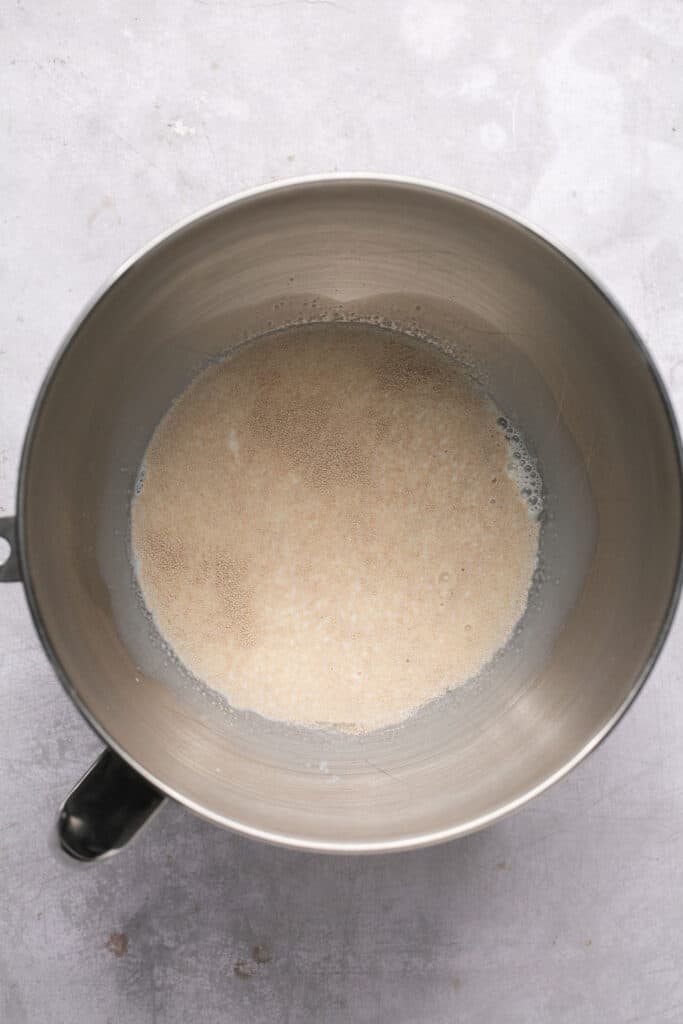 Sugar and yeast in a mixing bowl.