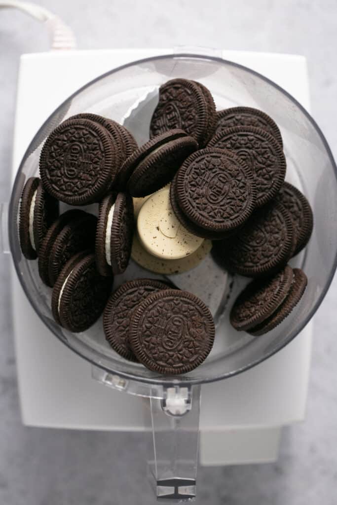 Oreos in a food processor before being processed.