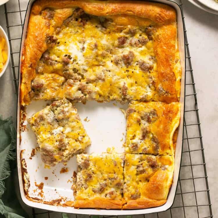Crescent Roll Breakfast Casserole in a baking dish, some cut into squares.