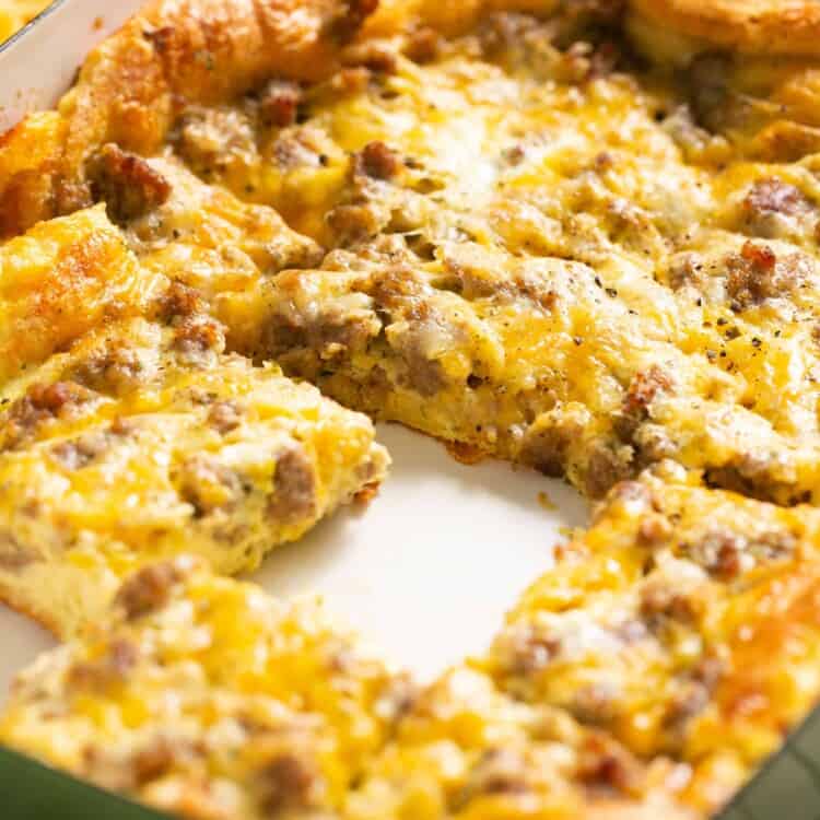 Crescent roll breakfast casserole cut into squares in a baking dish.