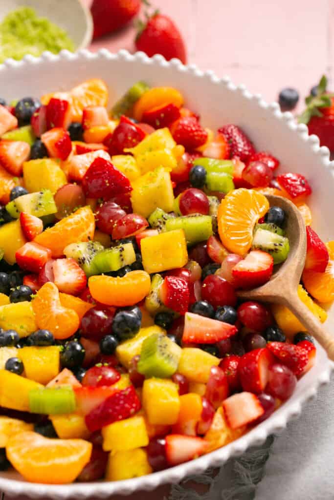 How to make rainbow fruit salad with honey lime dressing (process steps)
