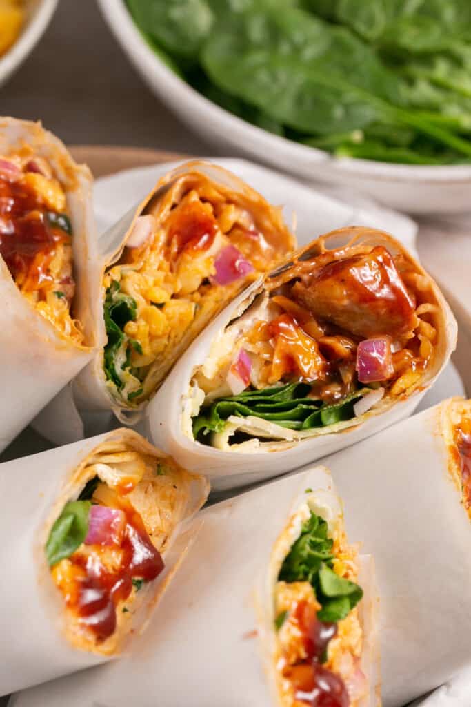 Air fryer bbq chicken (healthy, juicy, 20 minutes!) insides wraps with veggies and cheese.