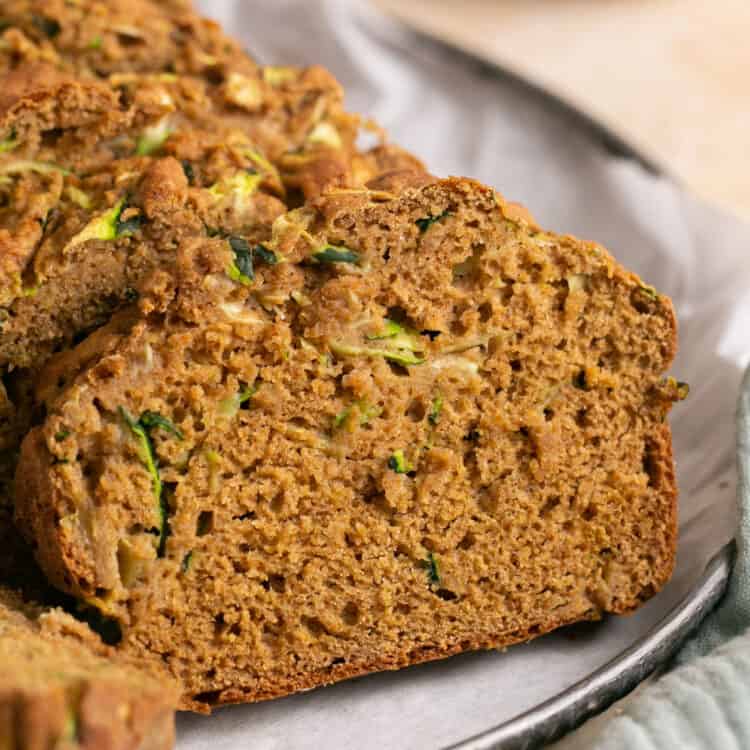 Sliced healthy zucchini bread on a plate.