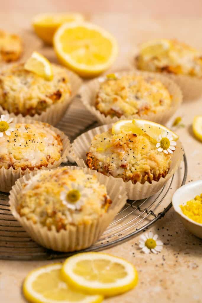 Lemon poppyseed protein muffins on a plate.