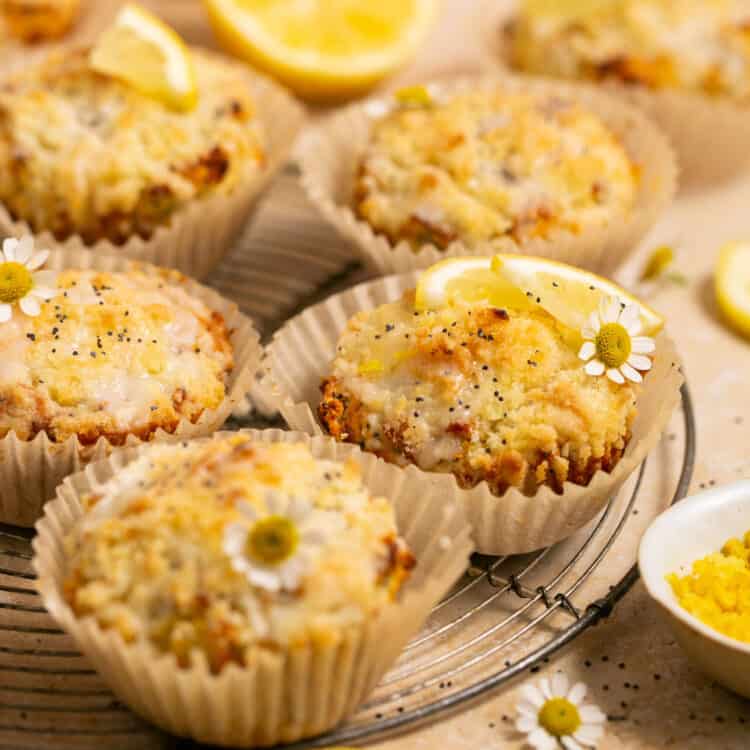 Lemon poppyseed protein muffins on a plate.