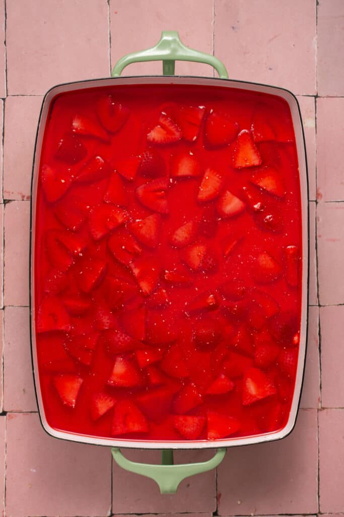 Strawberry jello topping on top.