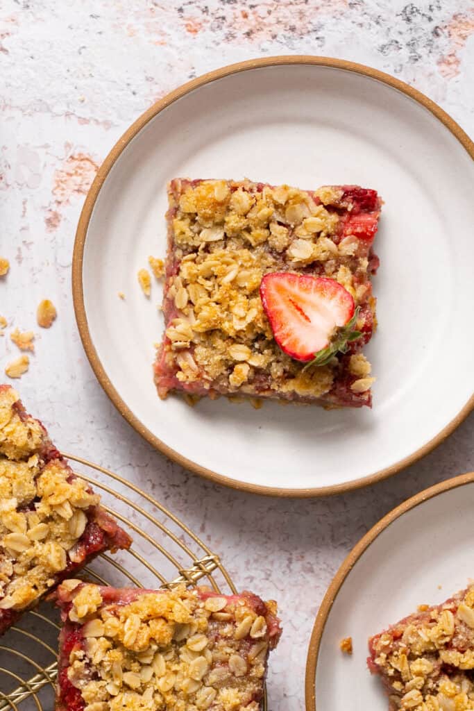 Healthy strawberry crumble bar on a plate.
