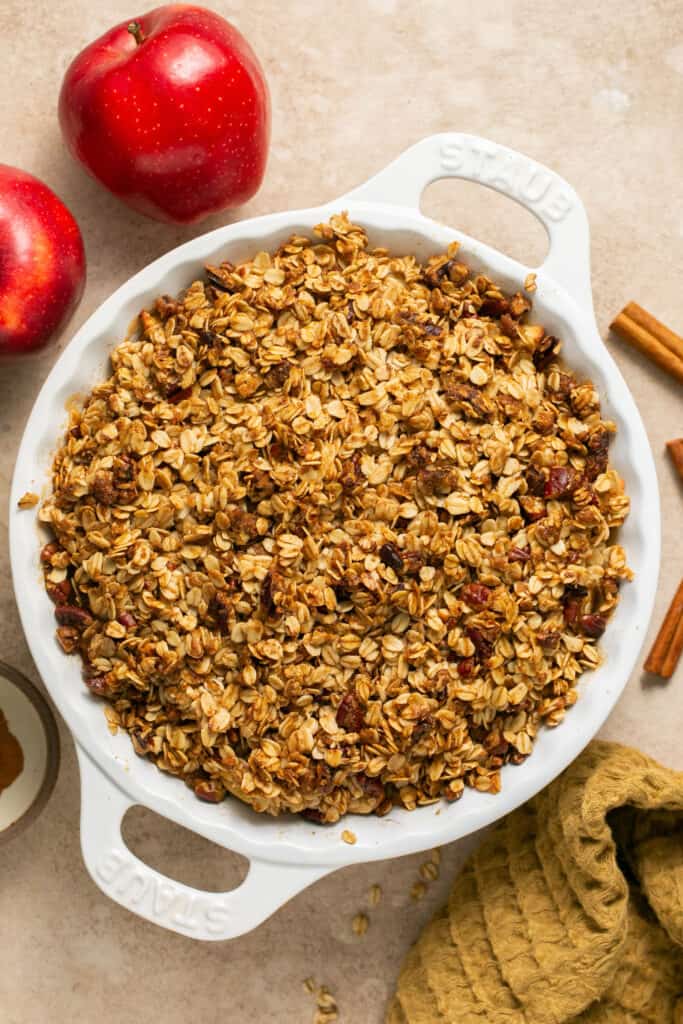 Healthy apple pecan crisp in a baking dish after being baked.