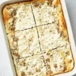 Goat cheese and turkey crescent roll bake in a baking dish.