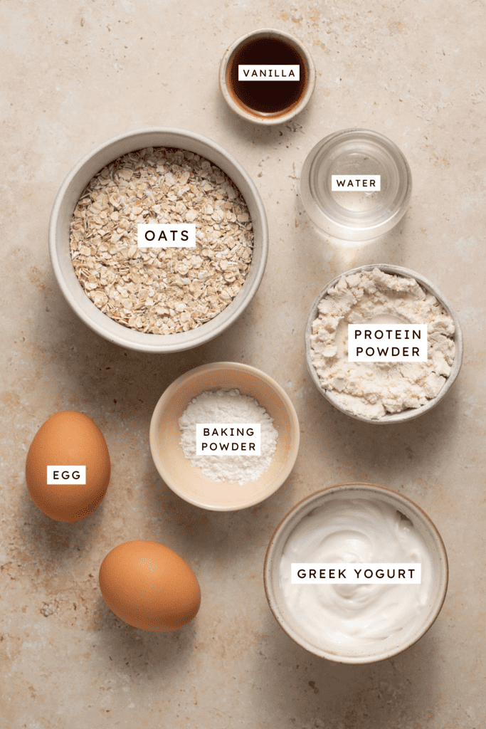 Ingredients for protein powder pancakes topped with greek yogurt.