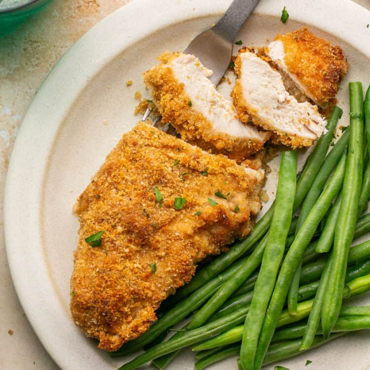 Meal Prep Breaded Chicken (No Egg) on a plate with green beans.