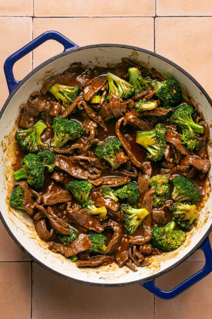One skillet steak and broccoli in a skillet.