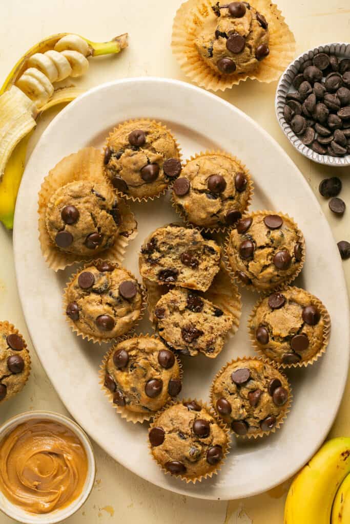 Peanut butter banana oat flour muffins on a tray.