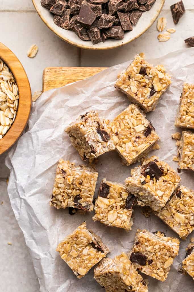 Heavenly hunks recipe cut into squares on parchment paper.