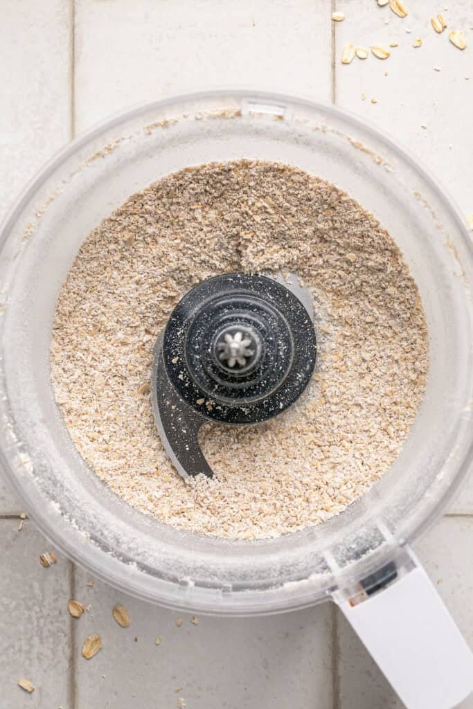 Oats in a food processor bowl.