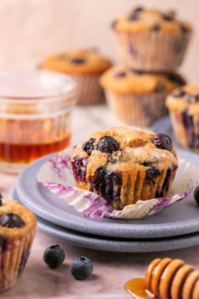 Greek yogurt muffins on small plates.