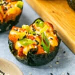 Zoomed in view of a baked salmon sushi cup.