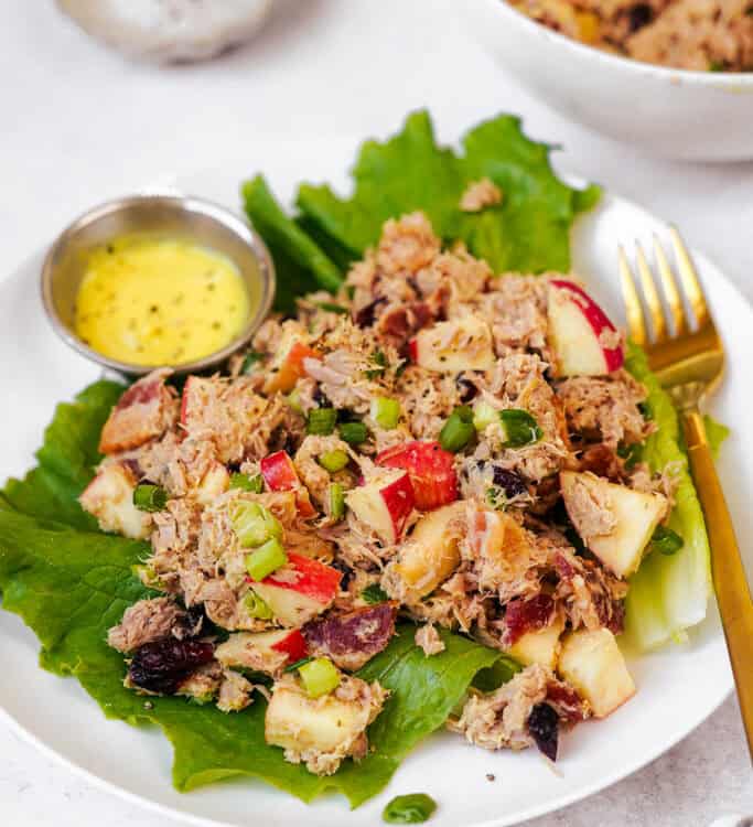 Honey mustard tuna salad on a plate with a fork.