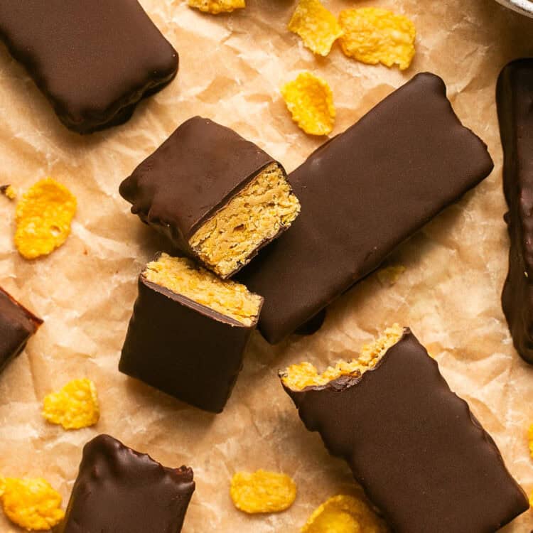 Chocolate peanut butter protein bars on parchment paper.