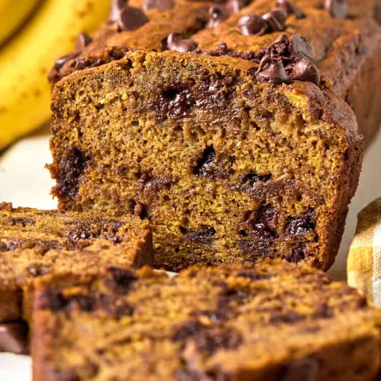 Sliced Brown Butter Pumpkin Banana Bread on a cutting board.