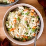 Crustless Chicken Pot Pie on in bowl with a spoon.