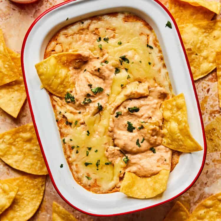 Refried bean dip with torilla chips.