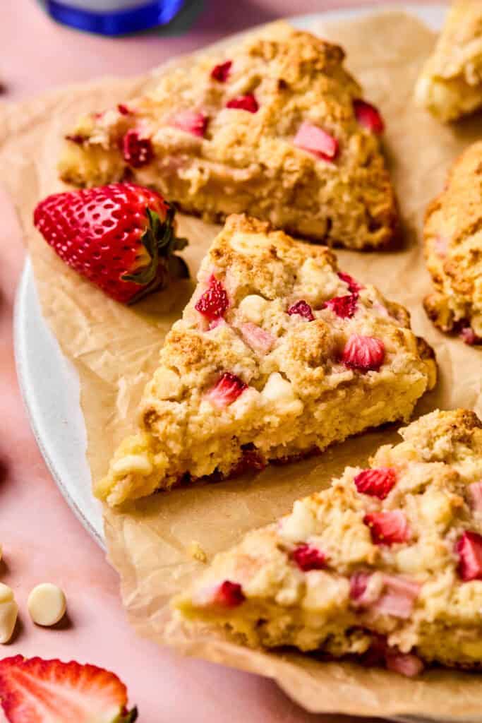 Pancake Mix Scones with strawberries on a plate.