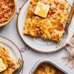 Maple Bacon Pancake Bake on a plate topped with butter and syrup.