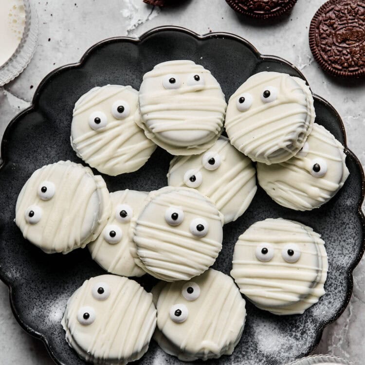 Oreo Mummy Cookies on a tray.