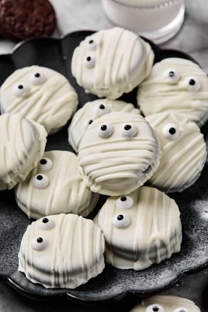 Oreo Mummy Cookies on a tray.